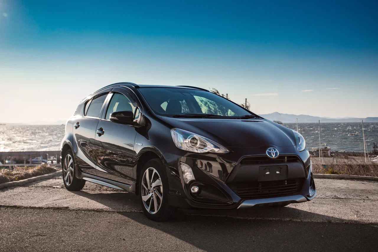 Купить Toyota Aqua NHP10 2017 года из Японии с аукциона - 1500, 74 л.с.,  Бензин, 1.5 X-URBAN, Правый руль, Вариатор, пробег 89500 - Sferacar.ru