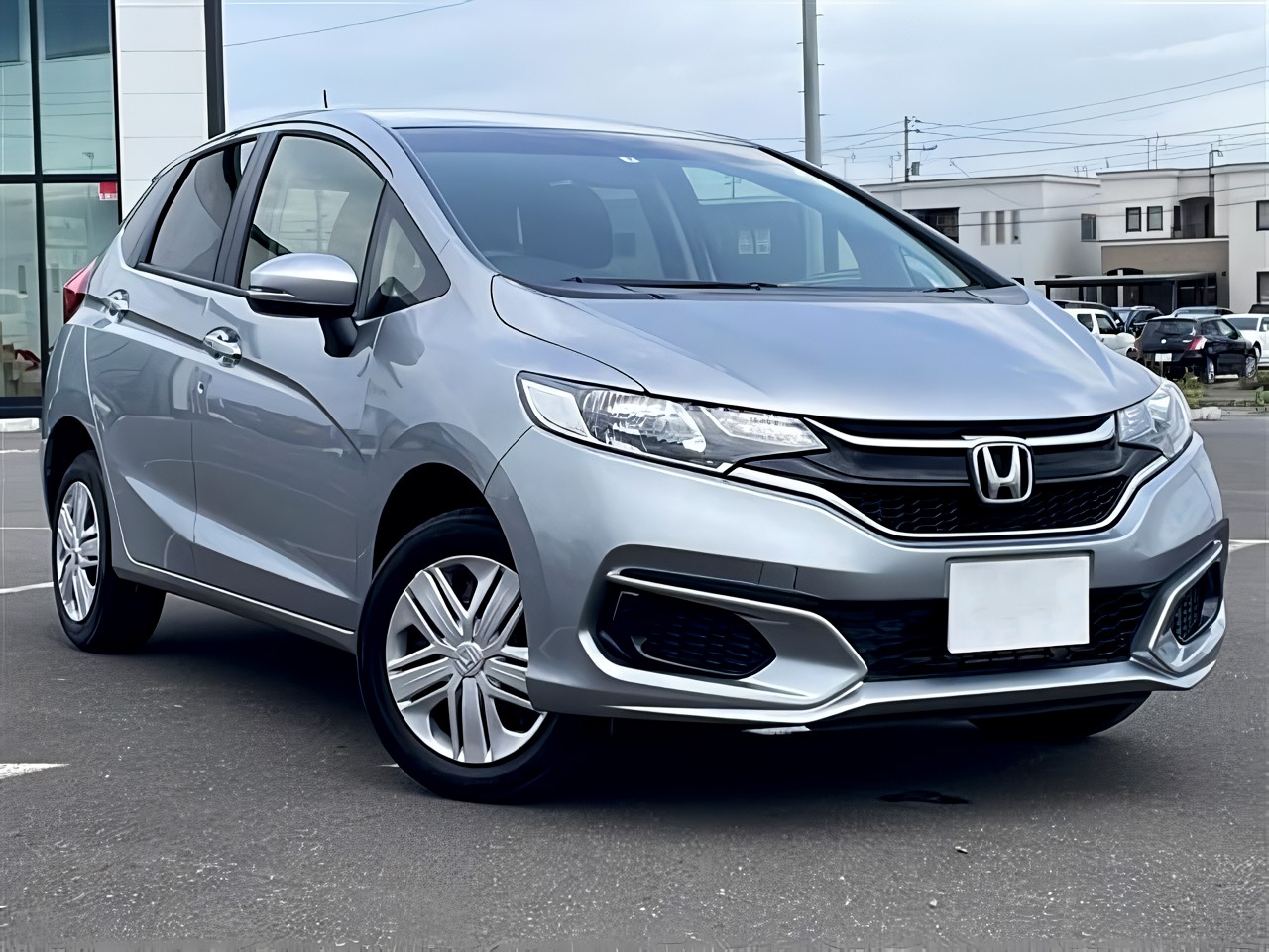 Купить Honda Fit GK4 2019 года из Японии с аукциона - 1300, 100 л.с.,  Бензин, 1.3 13G F 4WD, Правый руль, Вариатор, пробег 9000 - Sferacar.ru